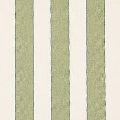 a green and white striped wallpaper with small dots on the bottom half of it