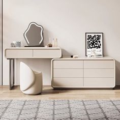 a room with a dresser, mirror and art on the wall next to an area rug