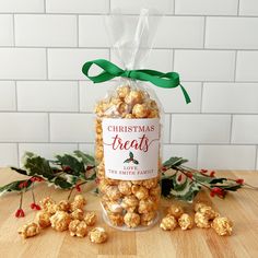 a bag of christmas treats sitting on top of a wooden table