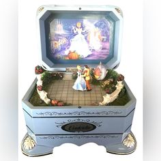 an open box with figurines in it