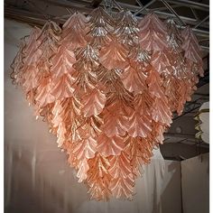 a pink chandelier hanging from the ceiling