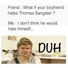 a man sitting at a table in front of a sign that says, friend what if your boyfriend hates thomas sangster? me i don't think he would hate himself