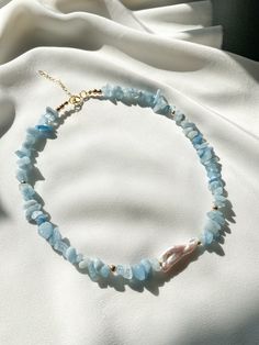 Baby blue aquamarine necklace with freshwater pearls. Stone and pearl choker.  ☆ MATERIALS AND DİMENSİON: -Aquamarine -Freshwater pearls -Hematite -Gold plated 925 silver closure and chain ( all of them are non-tarnish) Length: 42cm (16,5inch) plus 4cm (1,5inch) additional chain  If you want a size change, color of stones or replace silver on goldplease contact us or leave us a message. :)   ☆ DELIVERY AND PACKACHING: We send our products as fast as we can- in 1-3 working days! All products are Necklace With Pearls, Blue Choker, Necklace Everyday, Stone Choker, Aquamarine Necklace, Handmade Beaded Necklaces, Casual Jewelry, Gemstone Beaded Necklace, Jewelry Crystal