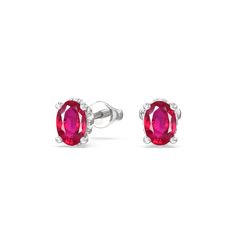 These lustrous gemstone studs display the elegance of the less-is-more aesthetic. Oval Created Rubys dot the earrings with vivid beauty. Underneath each colored gem is an under halo of lab-grown diamonds for that unexpected sparkle. Gorgeous Engagement Ring, Halo Earrings, Colored Gems, Gemstone Studs, Ruby Gemstone, Lab Diamonds, High Quality Jewelry, Diamond Earrings Studs, Diamond Studs