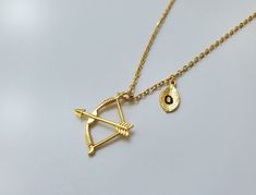 "❤ 18\" long chain But if you want shorter or longer chain, Just leave a note about this when you check out. I will make that size. ❤ T H E ∙ O R A C L E ∙ N E C K L A C E D E T A I L S * Gold" Bow And Arrow Pendant, Zodiac Signs Necklace, Archery Training, Sagittarius Necklace, Bow Arrow, Zodiac Sign Necklace, Arrow Pendant, Bow Arrows, Merch Store