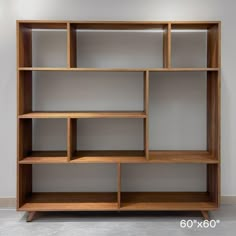 a wooden shelf with several shelves in it