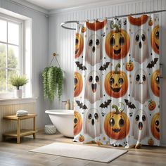 a halloween themed shower curtain with pumpkins and bats