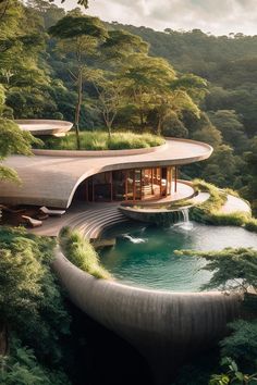 an unusual house in the middle of a forest with water running down it's side