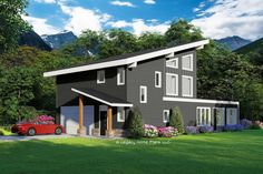 a two story house with a car parked in the driveway next to it and mountains in the background