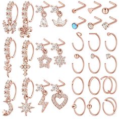 many different types of earrings and rings