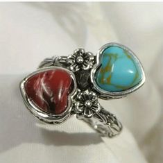 This Stunning Bohemian Silver Ring Features A Beautiful Combination Of Turquoise And Red Resin Gemstone Hearts And Silver Flowers, Set On A Silver Alloy Band. The Ring Is A Size 9 And Perfect For Adding A Pop Of Color To Any Outfit. The Intricate Design And Attention To Detail Make This Ring A Truly Unique Piece Of Jewelry. New, Individually Wrapped. Vintage Gemstone Rings, Resin Gemstone, Double Heart Ring, Mermaid Artwork, Green Hearts, Gemstone Rings Vintage, Heart Gemstone, Double Heart, Silver Flowers