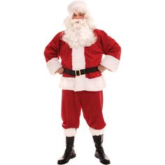 a man dressed as santa claus standing with his hands on his hips