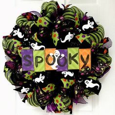 a halloween wreath with the word spook on it