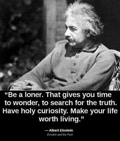 albert einstein quote about love and life with black and white photo in the background, there is