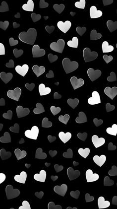 black and white hearts wallpaper with lots of heart shapes on the bottom right corner