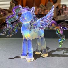 a glass figurine that looks like a pony