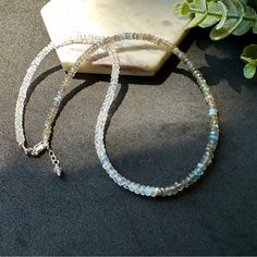 This Exquisite Beaded Necklace Features A Harmonious Blend Of Genuine Labradorite And Moonstone, With Each Natural Faceted Stone Bead Measuring 3.5 To 4mm. Crafted With Solid Sterling Silver, The Necklace Offers Both Durability And Elegance. With A Length Of 16 Inches And An Additional 1-Inch Extender Chain, It Provides Versatility For Various Styles And Occasions. Gemstone: 3.5 - 4mm Genuine Moonstone And Labradorite Natural Stone Bead. Metal: Solid Sterling Silver. Length: 16” Plus 1” Inch Ext Jewelry White, Labradorite Necklace, Stone Beaded Necklace, Half And Half, Labradorite Necklaces, Moonstone Jewelry, Necklace Sterling Silver, Moon Stone, Stone Beads