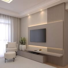 a living room filled with furniture and a flat screen tv mounted on the wall above it