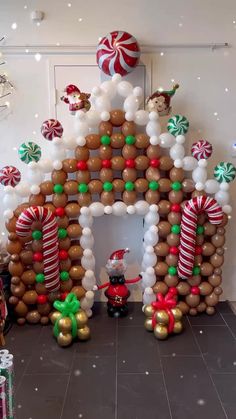 an inflatable gingerbread house decorated for christmas