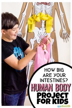 a young boy holding a pink bag with the text how big are your intestines? human body project for kids