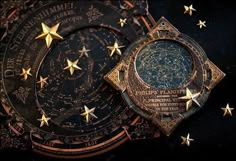 the astrological clock is surrounded by gold stars