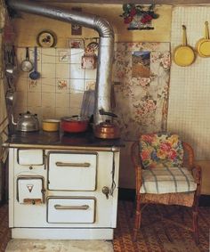 an old fashioned stove and oven in a kitchen