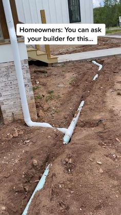 a house that has some pipes in the ground