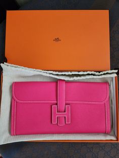 Hermes most beautiful pink! Super rare pink color of Rose Tyrien. Condition is Preowned but excellent. Please refer to pictures, if you need more pics please just ask :) 🌹Hermes Jige clutch 🌹Rose Tyrien color 🌹Epsom Leather. X Stamp 🌹Prestine condition Include Box, dustbag Due to high fees, if you want to pick up in LA area please private message me. only ship USA domestic.  I do signature. I also video & take pics of my packing/delivery to prevent disputes. Measurement is done by hand, there might be slight difference. I always & only support AUTHENTIC Items. Please buy with confident. I don't own a store, so No refund or return policy is strictly enforced. If you try to dispute to return this item due to authenticity, you need to provide a written authentication letter within 3 days Hermes Jige Clutch, Hermes Jige, Letter Logo, Pink Color, Bags Handbags, Leather Bag, Return Policy, Dust Bag, Company Logo