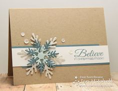 a close up of a snowflake on a card