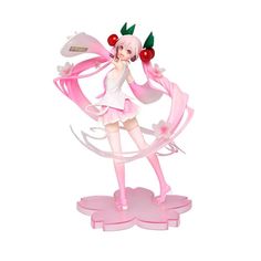 a figurine that is standing on a pink stand with cherries in her hair