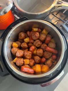 the food is being cooked in the pot on the stove