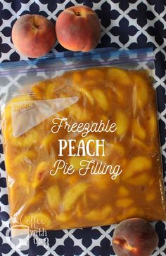 two peaches sitting on top of a table next to a bag of pie filling