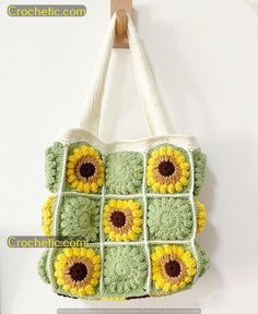 a crocheted sunflower purse hanging on a hook