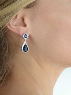 Sapphire%20Blue%20CZ%20Jewelry%20Set%0D%0AThis%20stunning%20sapphire%20cubic%20zirconia%20teardrop%20pendant%20and%20matching%20earrings%20with%20pave%20cz%20frames%20boast%20AAA%20quality%20CZ%20crystals%20plated%20in%20silver%20rhodium%20for%20the%20look%20of%20fine%20platinum%20jewelry!%20This%20top-selling%20jewel%20tone%20jewelry%20set%20is%20beautiful%20for%20the%20bride%20and%20also%20great%20for%20prom%2C%20bridesmaids%20or%20mothers%20of%20the%20bride.%0D%0ASize%3A%20Pendant%20and%20earrings%20are%26nbsp%3B1%201%2F4%22%20long.%20The%20necklace%20is%20adjustable%2016%22%20-%2018.%22%0D%0AStyle%3A%20Silver%2FSapphire%20blue.%0D%0AStyle%3A%204036Sset.%0D%0ANeed%20several%20sets%20of%20jewelry%20for%20your%20bridal%20party%3F%20You%20can%20buy%20in%20bulk%20and%20save!%0D%0APlease%20a Formal Earrings, Silver Jewellery Online, Blue Bridal, Cz Pendant, Cz Jewelry, Silver Jewelry Handmade, September Birthstone, Sapphire Earrings, Bride Jewellery