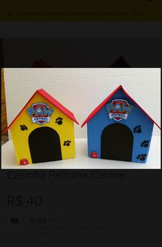 two small dog houses with paw prints on the front and back, one is blue and yellow