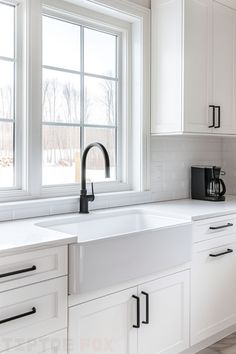 sink farmhouse white kitchen black handles black faucet White Kitchen Cabinets With Black Handle, White Kitchen Cabinets With Black Hardware, White Kitchen With Black Handles, Kitchens With Black Hardware, White Kitchen Hardware Ideas, Small Black And White Kitchen, White Kitchen Hardware, White Cabinets Black Hardware