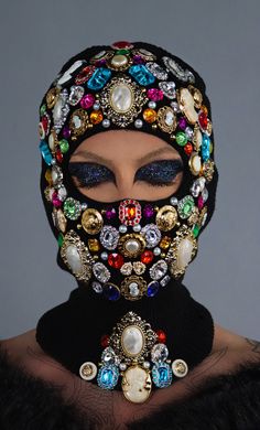 This Luxury balaclava is made of a stretchy, black acrylic knitted fabric adorned in Medieval antique inspired jewels. Lightweight Assorted jewels will vary in exact placement so yours will be identical to the photos but placement will not always be exact as every mask is hand-made and unique.  hand wash, lay flat to d Ski Masks, Gender Fluid Fashion, Look Festival, Fashion Mask, Fantasias Halloween, Masks Art, Ski Mask, Antique Inspiration, Acrylic Fabric