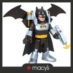 a batman action figure is shown with the bat symbol on it's chest and arms