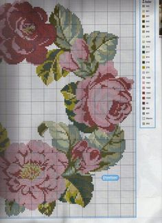 a cross stitch pattern with roses on it