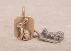 Rabbits almost always symbolize prosperity, abundance, good luck, and fertility. In most European cultures, rabbits are springtime animals, symbolic of fruitfulness and renewal. Measures 20 x 12mm. The bail opening measures 3 x 2.25mm. We offer the option of purchasing a chain, we do not offer any warranties or guarantees on chains. Gold Rabbit, Rabbit Pendant, European Culture, Custom Engagement Ring, Fertility, Rabbits, Spring Time, Good Luck, Ring Sets