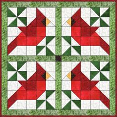 three red birds sitting on top of green and white quilted squares in the shape of stars