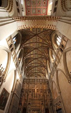 the interior of an old church with high ceilings