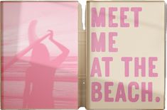 a pink and white sign with the words meet me at the beach