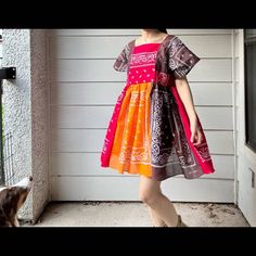 "Handmade Bandana Dress SKU 9192 red brown orange Size:L Approximate measurements of laying flat: Pit to pit: 20\". Pit to hem: 24\". Shoulder to hem: 34\". Waist: 19.5\". Seen on 5'5\" tall. Style - 100% Cotton. - Super soft, light and flowing. - The dress can be worn to either side.  - Unlined. Shipping: Shipping from Houston, Texas. It will take 3 days to ship your dress. Shipping worldwide.  Care instructions:  Machine wash on gentle with cold water or hand wash the dress. The dress can be d Bandana And Dress, Bandana Dress Pattern For Women, Bandana Upcycle, Dress Made From Bandanas, Bohemian Red Patchwork Dress, Bandana Dress, Quilted Dress, Most Beautiful Dresses, Matching Dresses