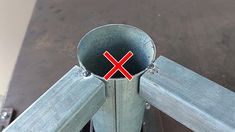 there is a metal pipe with a red x on it