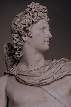 a statue of a man with curly hair