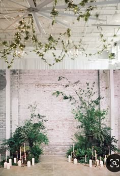 an indoor wedding ceremony with candles and greenery