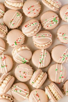 some cookies with frosting and sprinkles on them