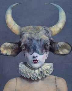 a painting of a woman with horns on her head and an animal's face