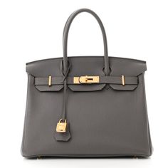 This is an authentic HERMES Togo Birkin 30 in Etain. This iconic handbag is finely handcrafted of togo leather in taupe grey. The bag features rolled leather top handles, a short flap, and a cinch-style strap closure with gold plated links, secured by a signature turn-lock and optional padlock. The flap opens to a matching matte chevre goatskin leather interior with zipper and patch pockets. Birkin 30, Taupe Grey, Togo Leather, Marble Print, Hermes Bags, Hermes Birkin, Leather Interior, Birkin Bag, Leather Top